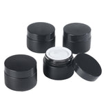 OverNews 4PCS 1oz Glass Jar Empty Small Cosmetic Lotion Containerswith Inner LinersBlack Lid Spatula (Black)