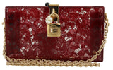 Dolce &amp; Gabbana Pochette à bandoulière en dentelle en plexiglas rouge foncé