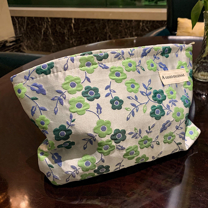 Women's Embossed Flower Cosmetic Bag - Large Capacity