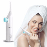 Dental Flusher with Spray and Press Features