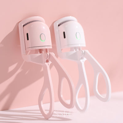 UltraGlow Electric Eyelash Curler Long-Lasting Curl for Perfectly Defined Lashes Your Professional Makeup Essential Eyelash Curlers Kit Lightweight Plastic Cosmetic Pack