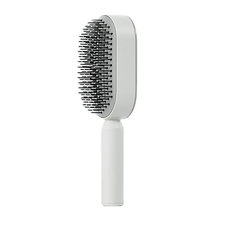 Brosse à cheveux antistatique autonettoyante